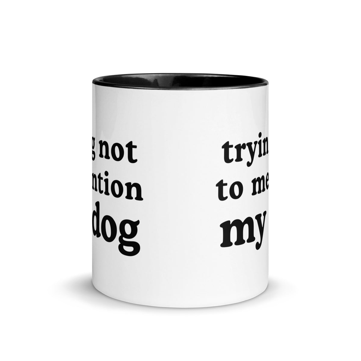A white ceramic mug with a black interior and black printed text on the side, shown on a clean white background.